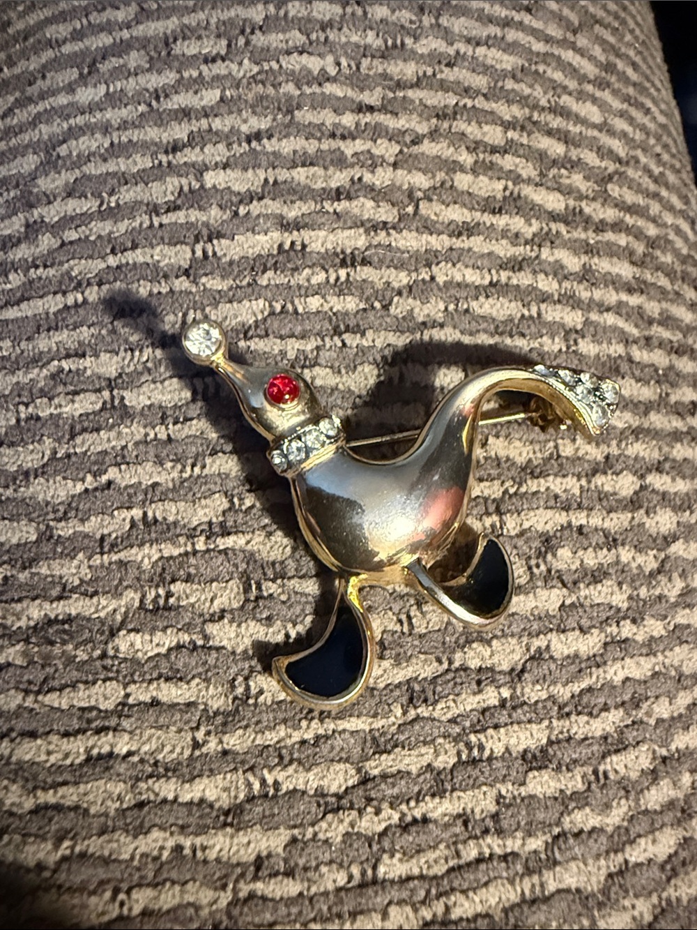 Gold-tone seal Brooch with Black Enamel and Rhinestones